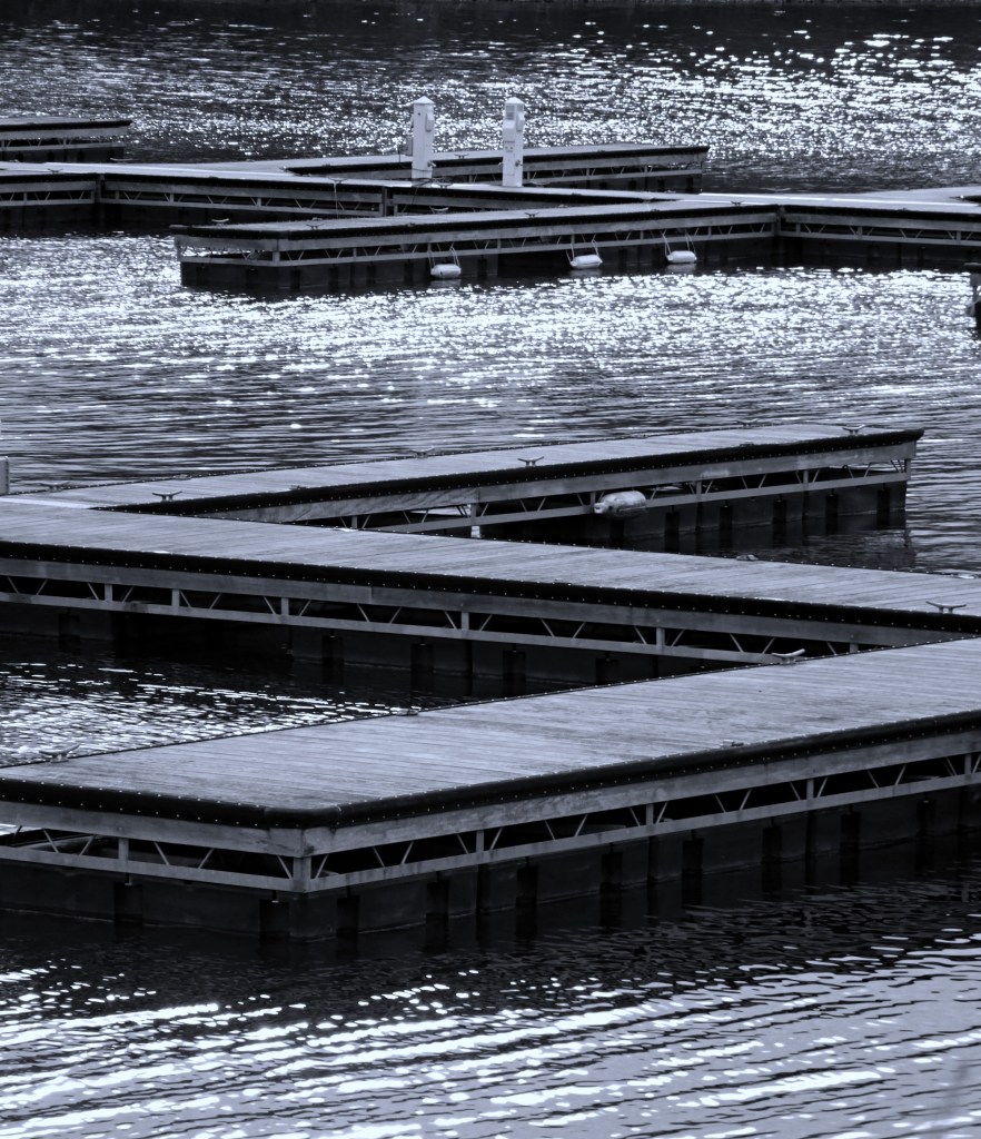 blue-toned alum creek dock with sunlight reflecting on water